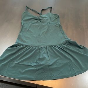 NWT Arie exercise dress. Full bodysuit fit underneath with shorts all built in.